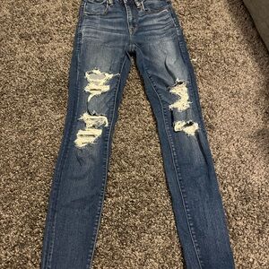 American Eagle Hi-Rise Jegging Distressed Blue Jeans size 2